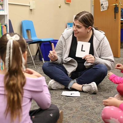 a student teaches a class