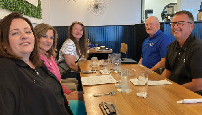 members of the network of partner schools meet together