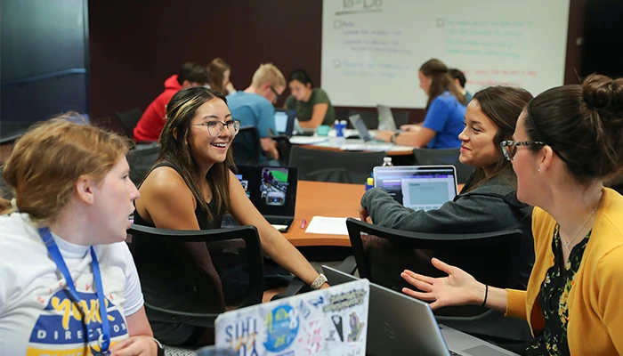 students have a discussion during a class