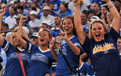 Students cheering  on the lopers