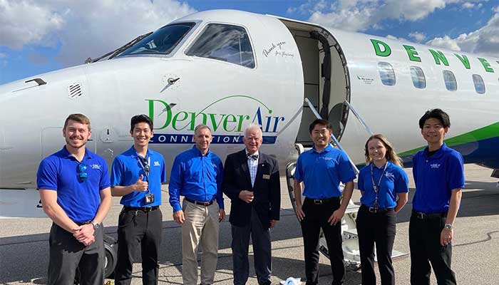 Emily Farley in front of the Regional Jet