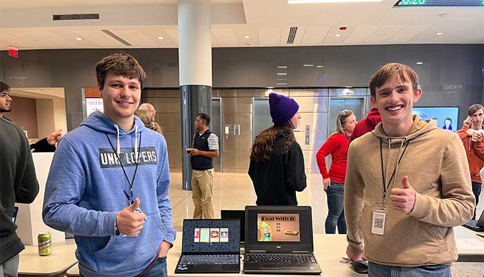 Student presenting a case at K-State for Hack Thron Competition 