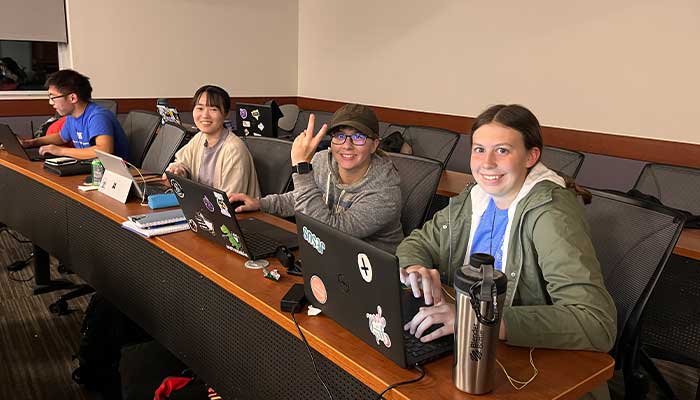 Student working on cases during a competition 