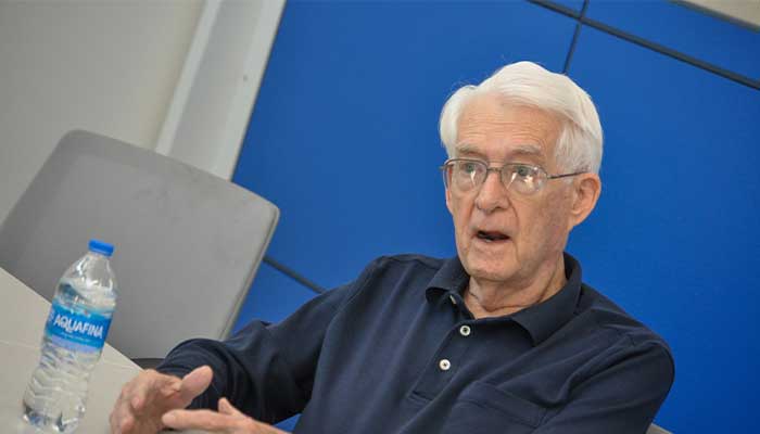 Dr. Envick Speaking in a Conference Room