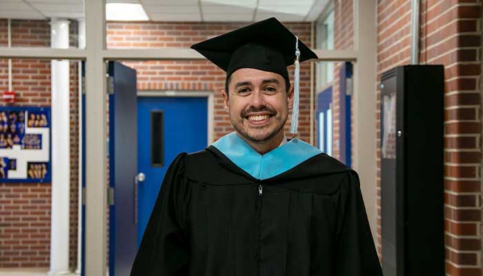 John Kretlow in his graduation regalia during UNK's winter 2024 commencement ceremony.