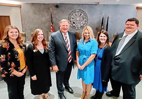 The 2021-2022 Leadership UNK class poses with Chancellor Kristensen outside of a Board of Regents meeting