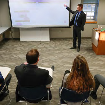 student teaching others in classroom