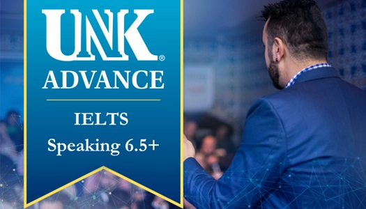 stock photo of a person speaking to a crowd with a unk advance banner over it