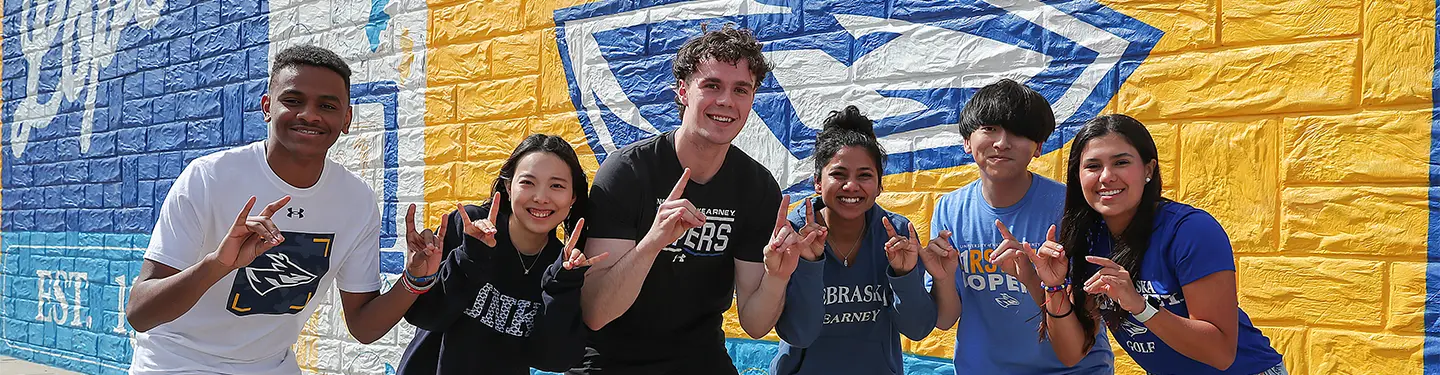 International Students throwing the Lopes 