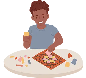 Smiling child working on a mosaic craft at a table, holding a small tile.