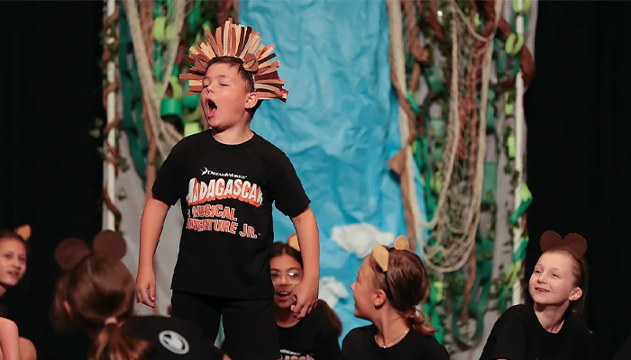 students perform in finding madagascar jr