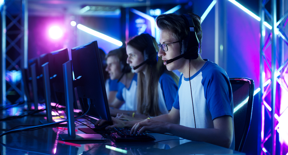 People competing in esports tournament
