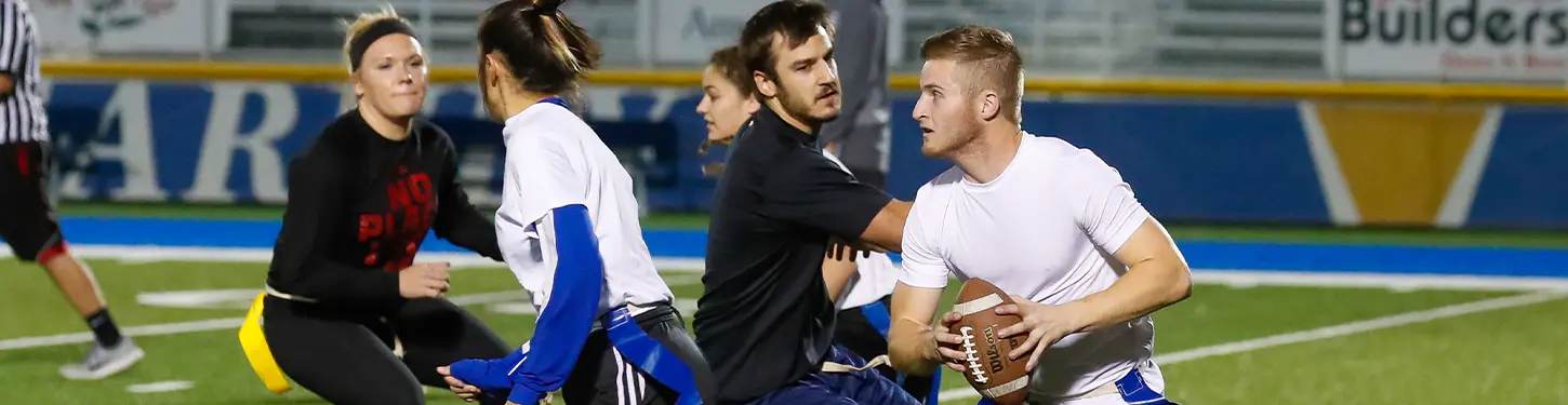 Students playing intramural football