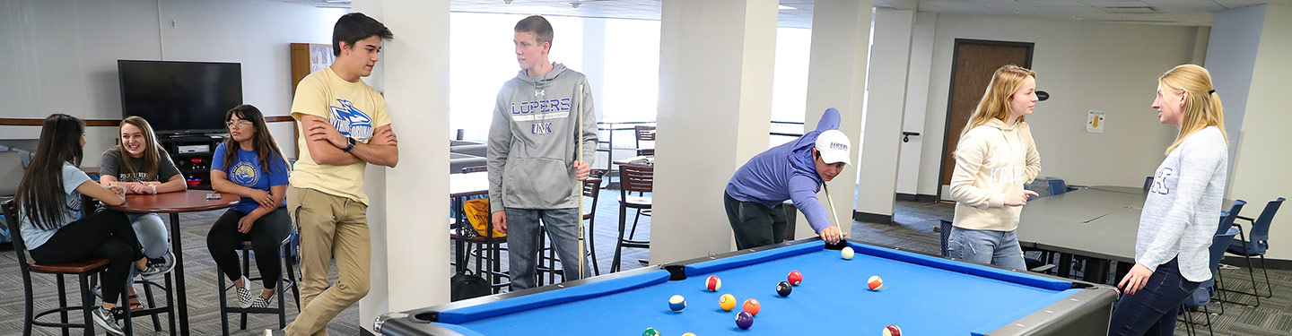 Students playing pool