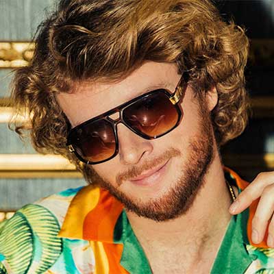 close up picture of yung gravy wearing sunglasses