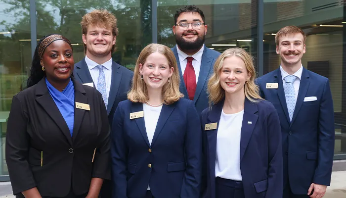 student government members pose for a photo with chancellor