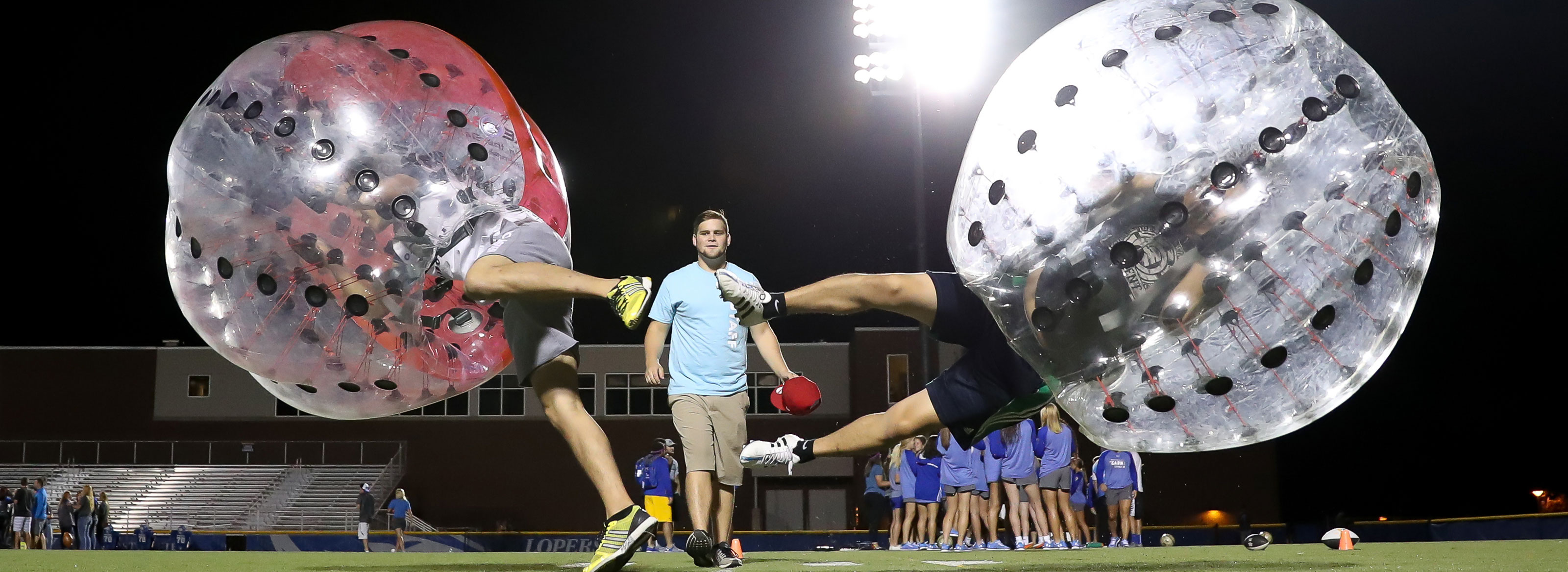 Students enjoying activities at UNK's Lopers Under the lights event