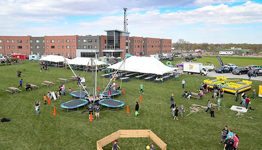 Students and Community at Celebrate Kearney event at University Village in front of Village Flats