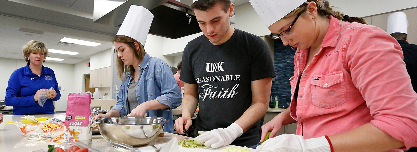 Students making food together