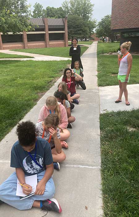 students and instructors participate in an outdoor activity